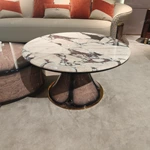 Designer Nesting Coffee Tables with Organic Curves and Layered Silhouettes